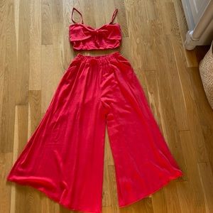 Red MULLA linen & polyester two piece outfit.